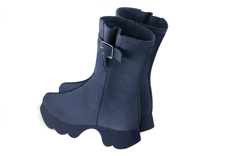 Denim blue women's ankle boots with a zip on the inside. Round toe. Low rubber soles. Rear view - Florence KOOIJMAN